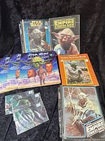 Group shot of all Star Wars books, activity book and postcards