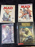 Group shot showing both MAD magazines, Yoda notebook and Empire Strikes Back poster book