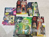 Group shot of all five packaged Star Wars figures
