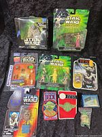 Group shot of all eight Star Wars collectibles in packaging