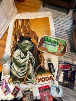 Group shot showing towel, tray, soda cup, planter, soda can, packaged figures, stamper, wallet and calling card