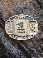 Front view of pewter-tone postal worker belt buckle