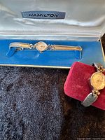 Hamilton ladies wristwatch in presentation box and Lady Elgin watch alongside