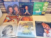 Group shot of all nine record covers