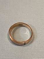 Ring interior showing stamp and engraving