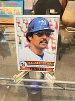 Front view of 1979 Topps Reggie Jackson #700 card on stand