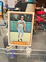 Front of 1982 Fleer Cal Ripken Jr. rookie card on stand