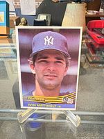 Front of 1984 Donruss Don Mattingly rookie card on stand
