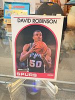 Front view of David Robinson rookie card on stand