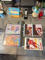 All five jumbo cards arranged on glass table