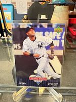 Front of 2006 Upper Deck Derek Jeter card in sleeve
