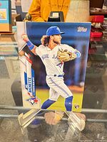 Front of Bo Bichette rookie card showing player image, Topps logo, RC logo