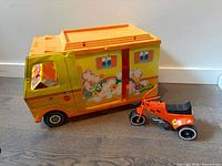 Overall view of Barbie camper van and trike showing colours, decals and scale