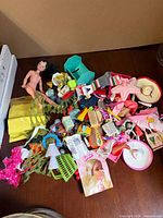 Overall view of doll and accessory pile