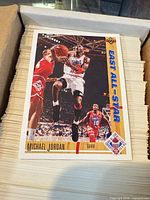 Top view of box showing Michael Jordan East All-Star card on stack of cards