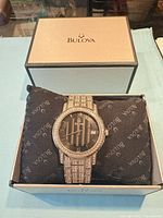 Watch in original Bulova box, front view