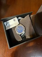 Watch in open Bulova box with tags visible