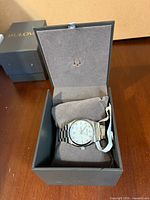 Watch inside open Bulova presentation box with outer box visible