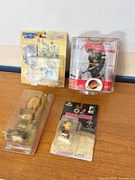 Group shot of four packaged NHL action figures