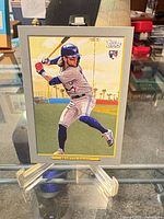 Front view of Bo Bichette Topps Turkey Red rookie card on stand