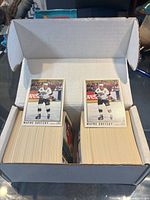 Open storage box showing two stacked card sets with Wayne Gretzky card on top of each set
