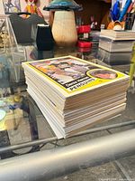 Stack of hockey trading cards, top card Dennis Herron Penguins with yellow border