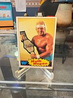 Front of Hulk Hogan trading card on stand