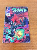 Front cover full view showing title, artwork and wear