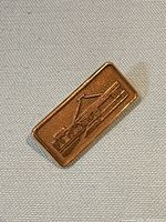 Front view showing building motif and overall design