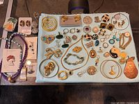 Overall view of entire jewelry lot on cloth