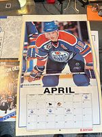 Interior April page with Craig Simpson photo and monthly grid