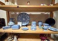 Overall shelf view showing 12 blue jasperware pieces