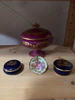 Group shot of all four Limoges porcelain pieces