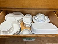 Drawer view showing full assortment of CorningWare pieces