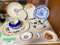 Overview of all ten ceramic pieces displayed on counter