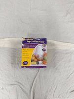 Front view of boxed electric baby food processor