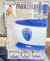 Front view of boxed HoMedics ParaSpa Deluxe Paraffin Bath