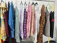Full rack of fifteen assorted dresses