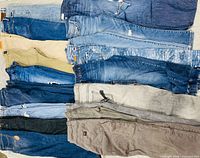 Top view showing 15 pairs in various blue, khaki and grey tones