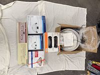 Group of all six boxed fixtures laid out