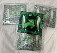 Front view showing four FMG Glimmer Diamond Vibes palettes, three in bubble wrap, one unwrapped