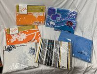 All six unopened sheet and pillowcase packages displayed on white backdrop