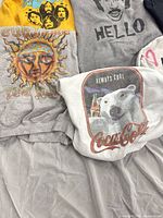 Group showing Coca-Cola, Sublime, Beatles, Hello sweatshirts