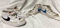 Both pairs of Nike Blazer sneakers side by side