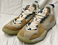 Front and top view of both shoes displaying uppers, laces and toe boxes