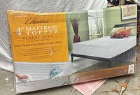 Front of sealed box showing Novaform Choices 4" Mattress Topper Full