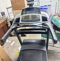 Front view showing console, handrails, safety key and belt