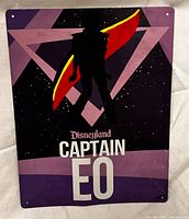 Front view of entire Captain EO tin sign showing graphics and text