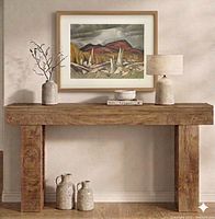 Room view of framed lithograph on wall showing frame style and scale