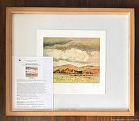 Framed lithograph with COA sheet visible